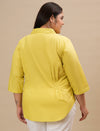Plus-size woman in back view wearing Yellow Plus Size Cotton Shirt with long sleeves and relaxed fit