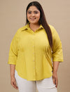 Plus-size woman in front view smiling while wearing Yellow Plus Size Cotton Shirt featuring button-down front
