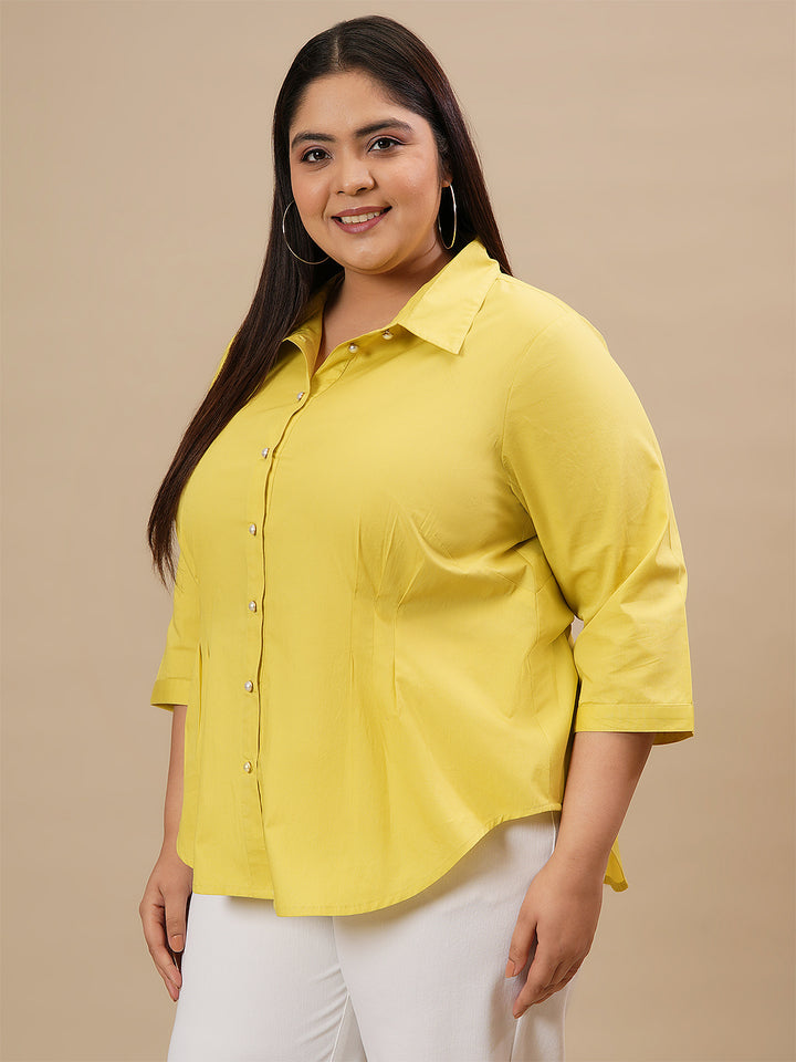 Plus-size woman in left side view wearing Yellow Plus Size Cotton Shirt with full sleeves and comfortable fit