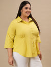 Plus-size woman in right side view wearing Yellow Plus Size Cotton Shirt with curved hem and breathable cotton texture
