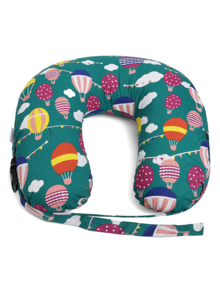 infant lying down on maternity feeding pillow