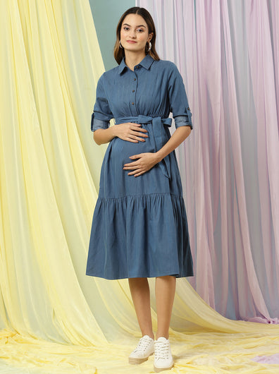 Front view of Wobbly Walk Denim Maternity Dress featuring a collared neckline, full sleeves with cuff openings, and a midi length