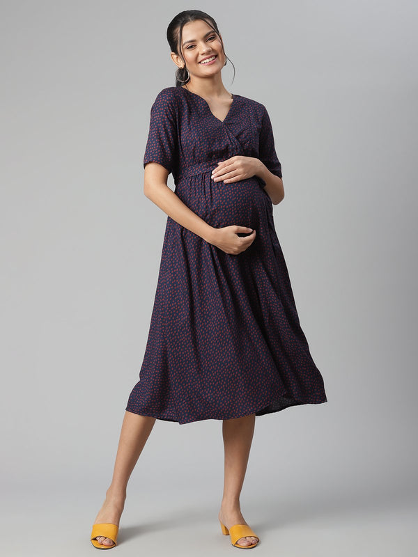 women wearing polka dot pregnancy dress