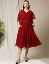 Front view of Wobbly Walk Red Cape Maternity Dress featuring a V-neckline, flutter sleeves, and a high-low hemline
