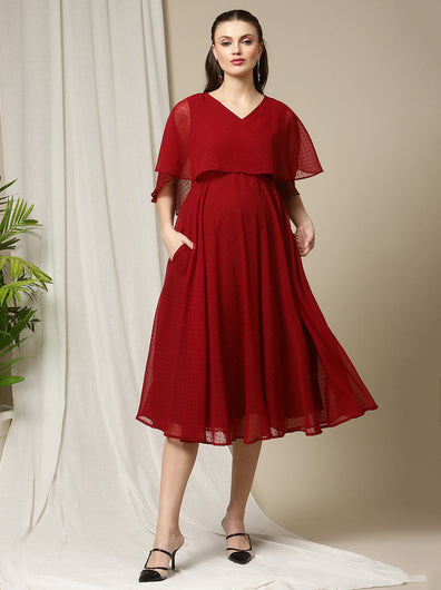 Front view of Wobbly Walk Red Cape Maternity Dress featuring a V-neckline, flutter sleeves, and a high-low hemline